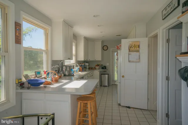 a view of a lake with a yard