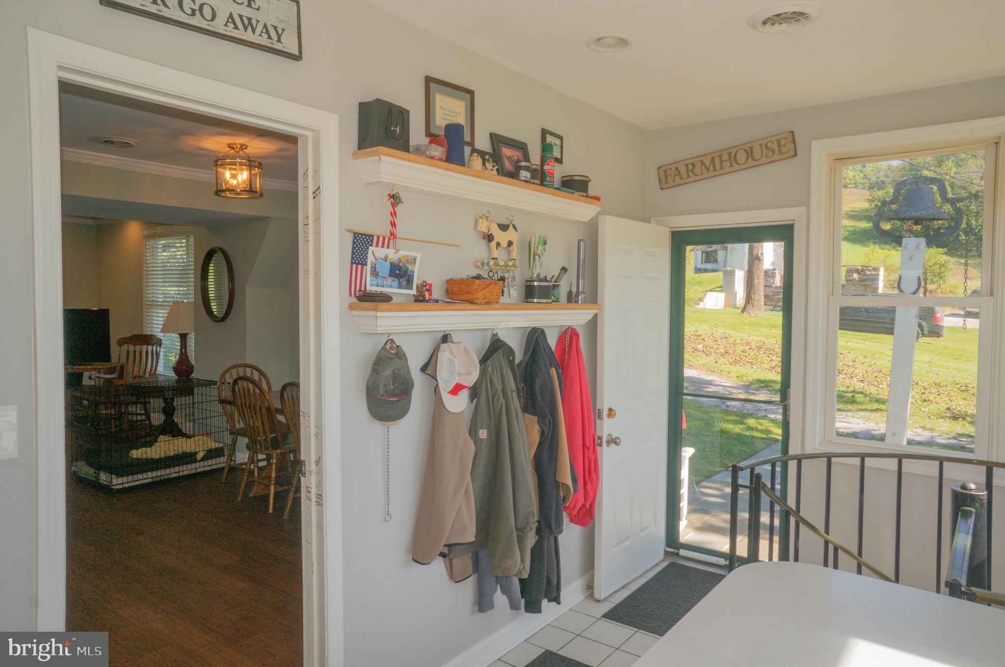 4205 Sams Creek Road New Windsor, MD 21776 - Photo 40 of 103 a view of walk in closet with clothes and shoes