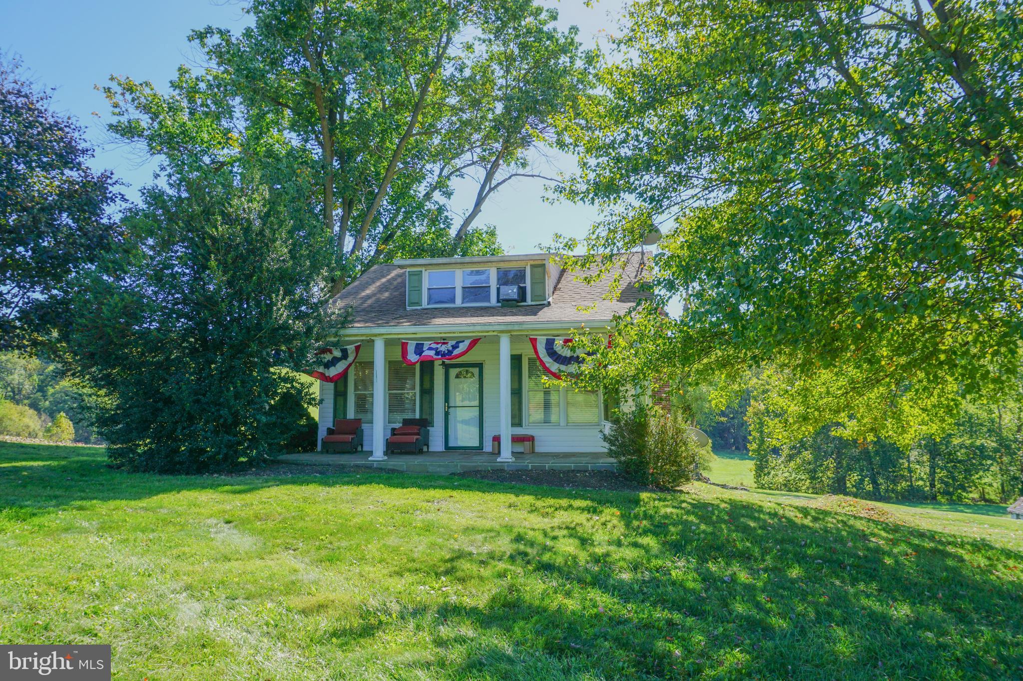 4205 Sams Creek Road New Windsor, MD 21776 - Photo 43 of 103 front view of a house with a big yard