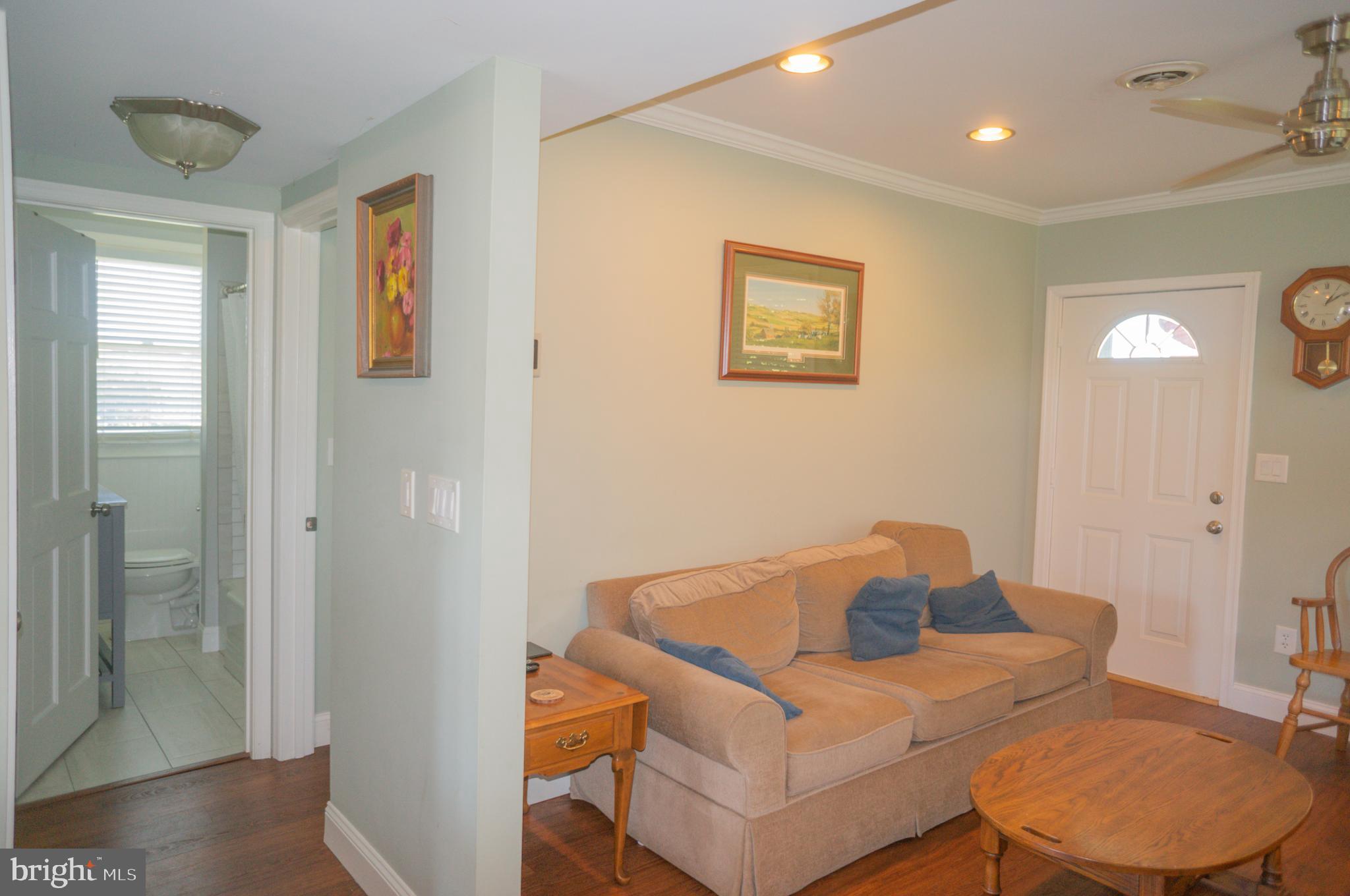 4205 Sams Creek Road New Windsor, MD 21776 - Photo 44 of 103 a view of a livingroom with furniture and windows