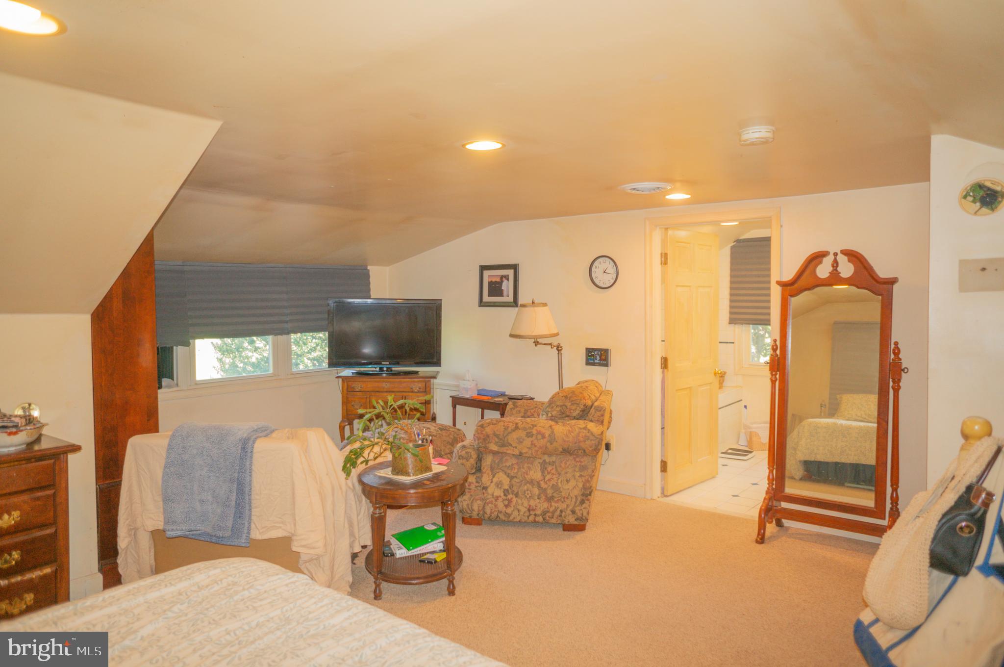 4205 Sams Creek Road New Windsor, MD 21776 - Photo 54 of 103 a living room with furniture and flat screen tv