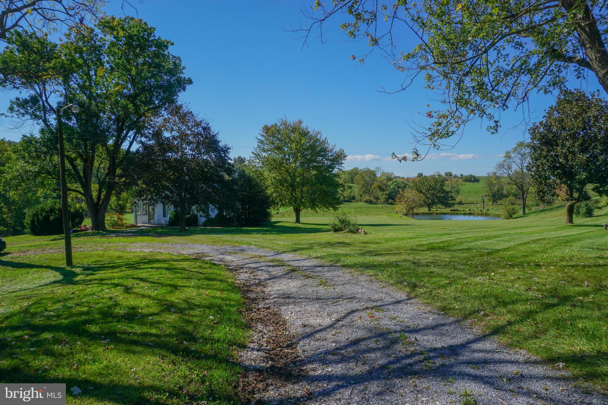 4205 Sams Creek Road New Windsor, MD 21776 - Photo 59 of 103 a view of a park with large trees
