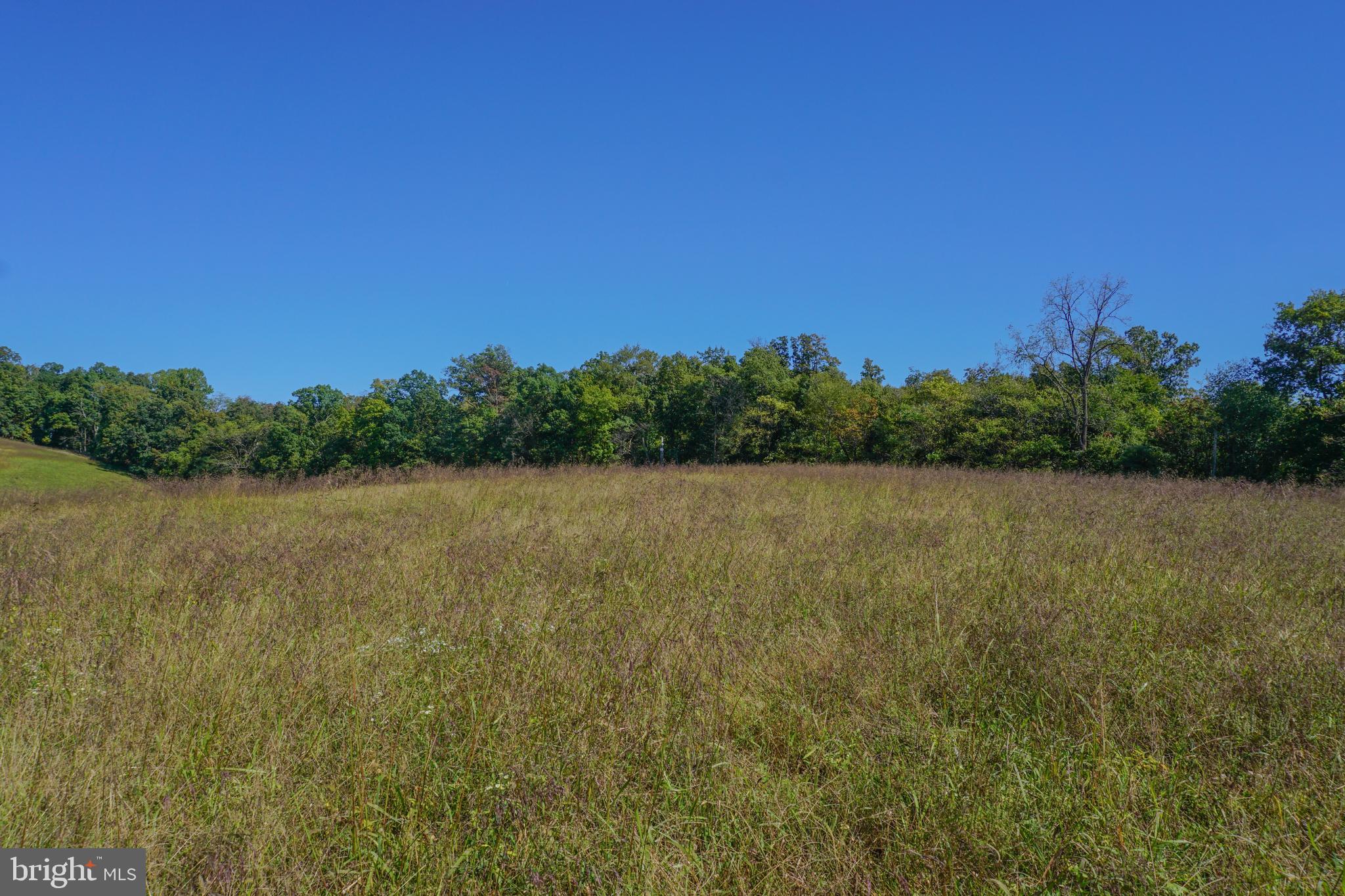 4205 Sams Creek Road New Windsor, MD 21776 - Photo 96 of 103 a view of a lake with a city view