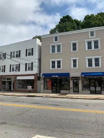 a view of a building with a street