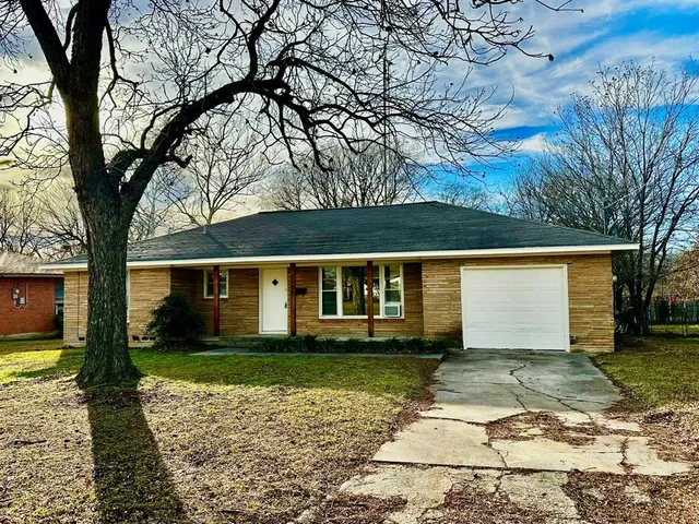 front view of house with a yard