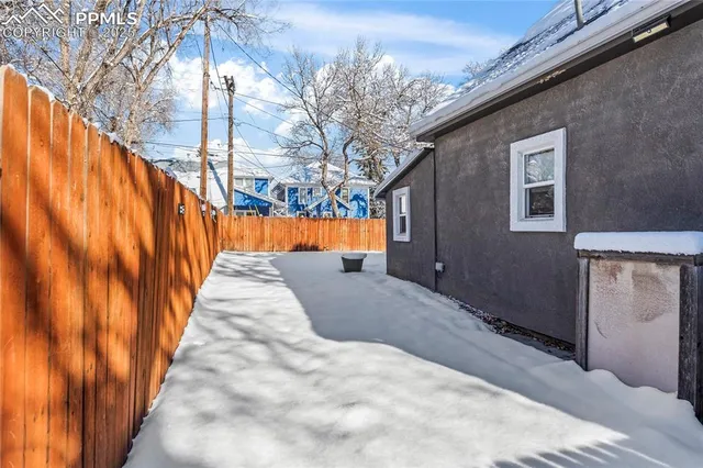 a view of swimming pool with a backyard