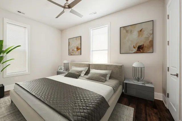 a bedroom with bed painting on the wall and a window