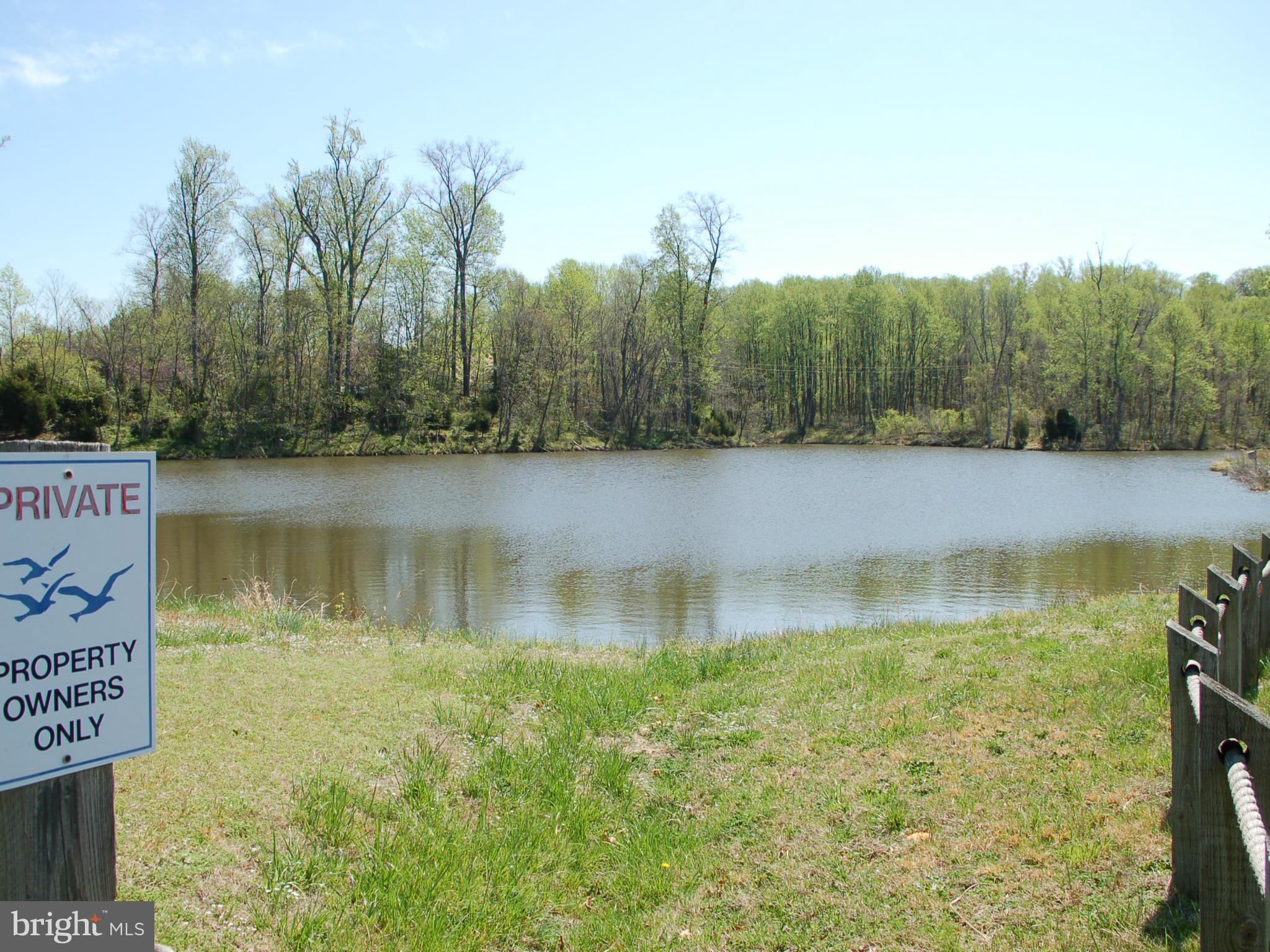 58 Marineview Road King George, VA 22485 - Photo 9 of 17 a view of a lake with trees in the background