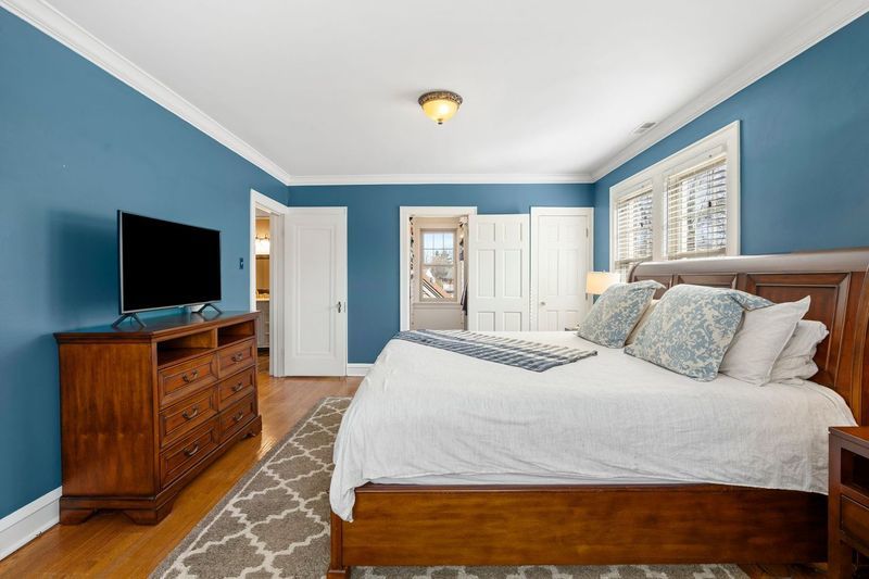 306 Southcote Road Riverside, IL 60546 - Photo 26 of 47 a bedroom with a bed and a flat screen tv