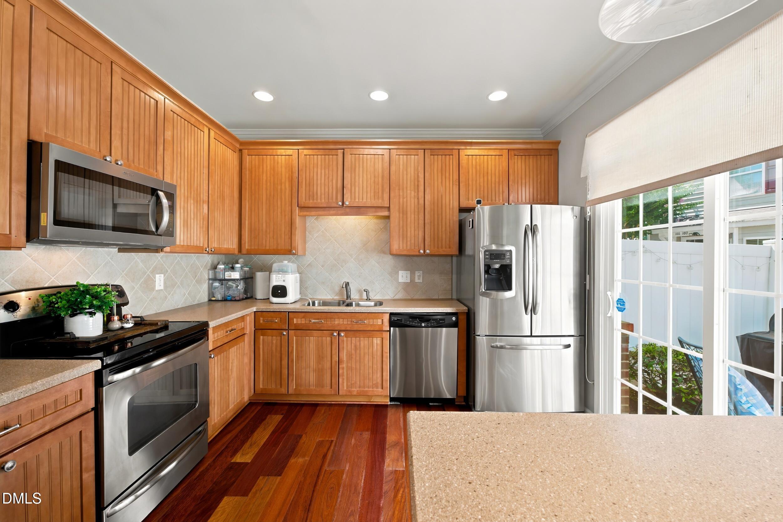 1121 Consortium Drive, Unit 115 Raleigh, NC 27603 - Photo 12 of 22 12 -1121 consortium dr, interior, kitche