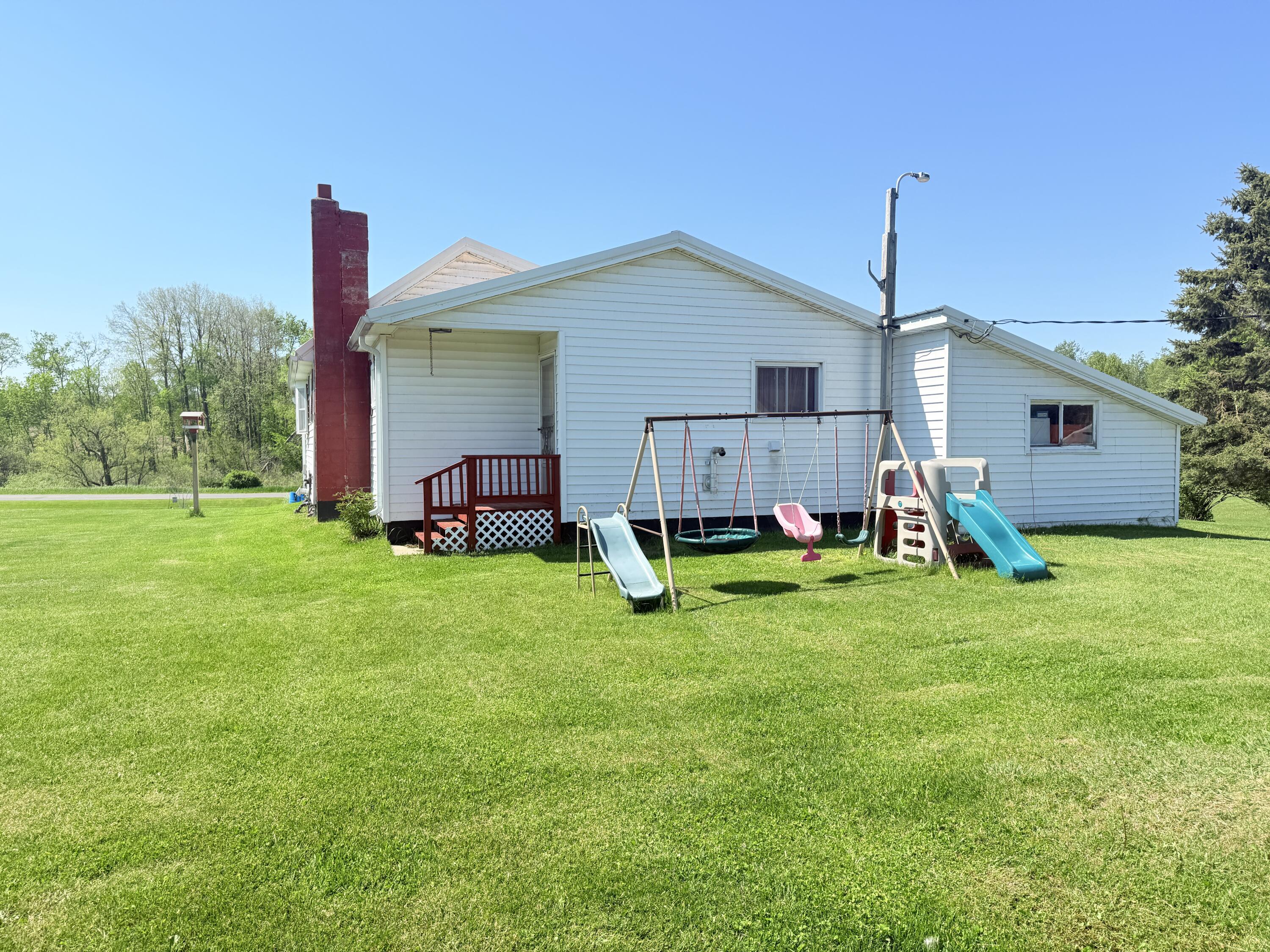 14328 16 Mile Road Leroy, MI 49655 - Photo 3 of 16 IMG_2127