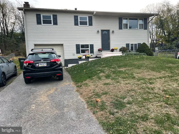 a house view with a garden space
