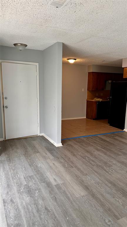3812 Stuart Road Denton, TX 76209 - Photo 2 of 9 a view of an empty room