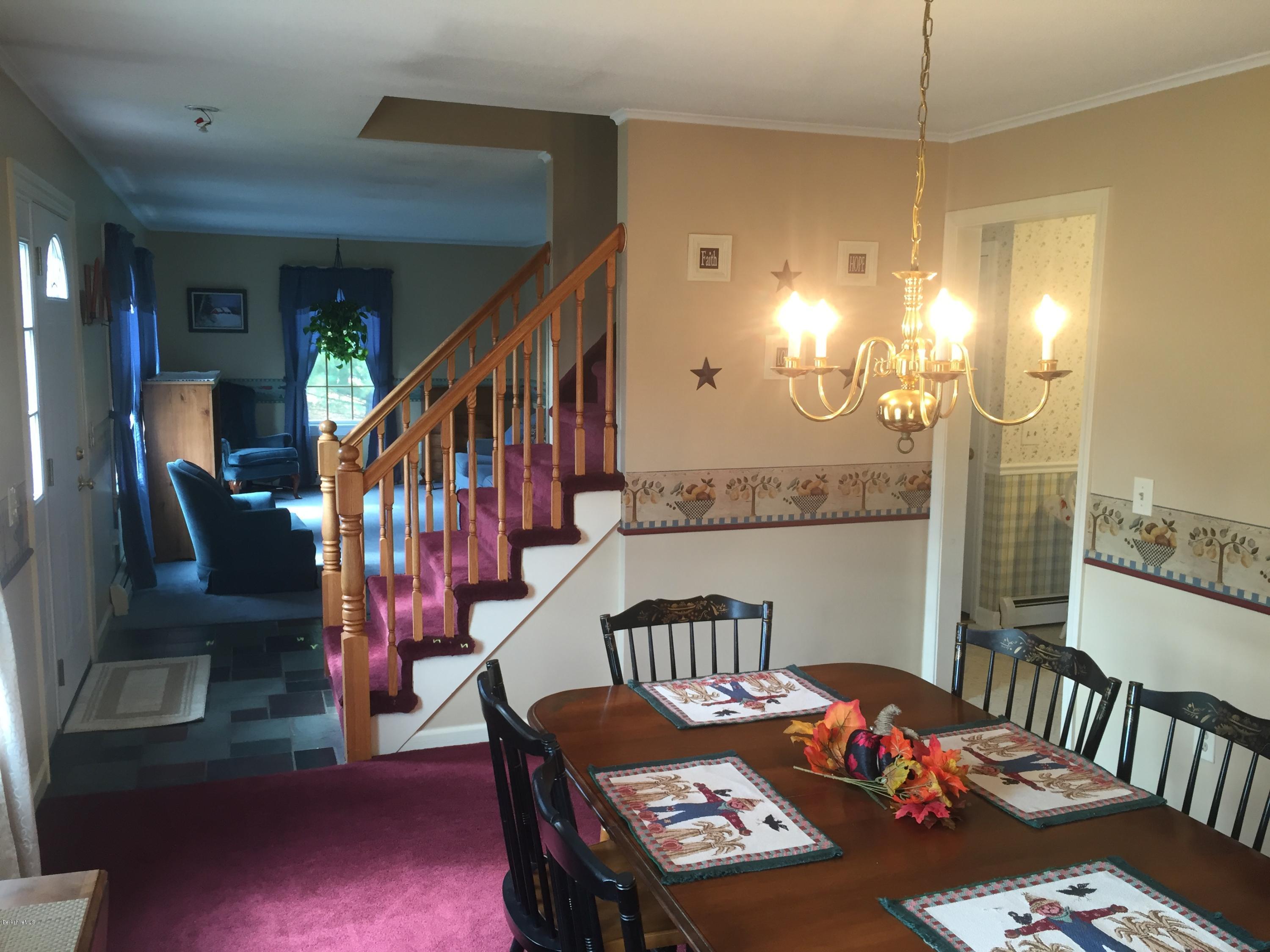 4 Melbourne Road Pittsfield, MA 01201 - Photo 3 of 24 Dining to living room
