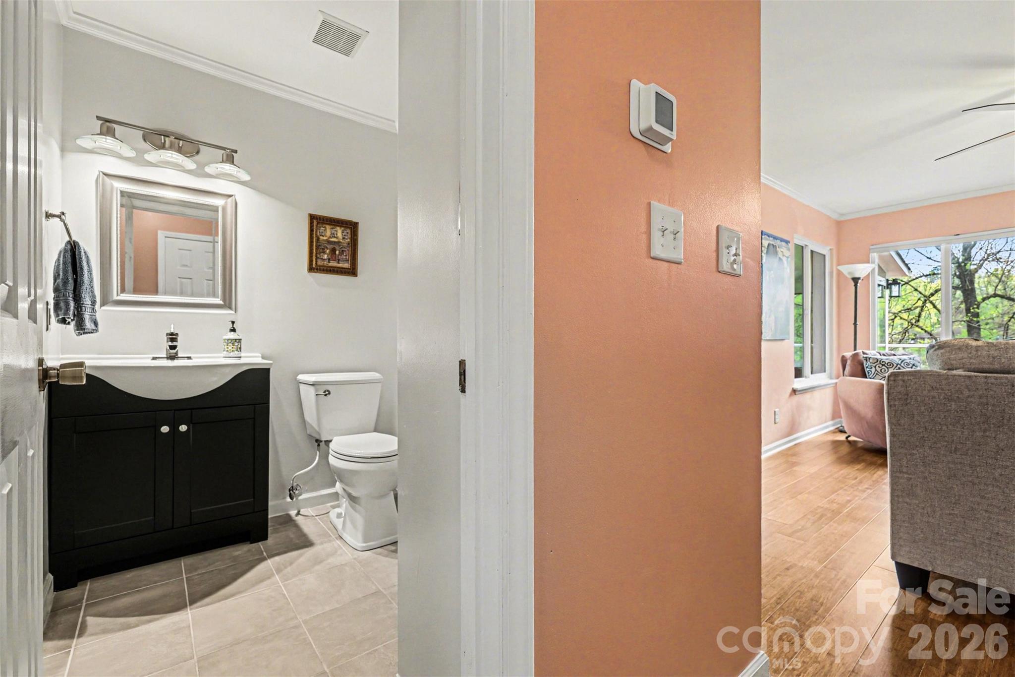 26030 Misty Way Drive Tega Cay, SC 29708 - Photo 13 of 43 a spacious bathroom with a toilet sink and mirror