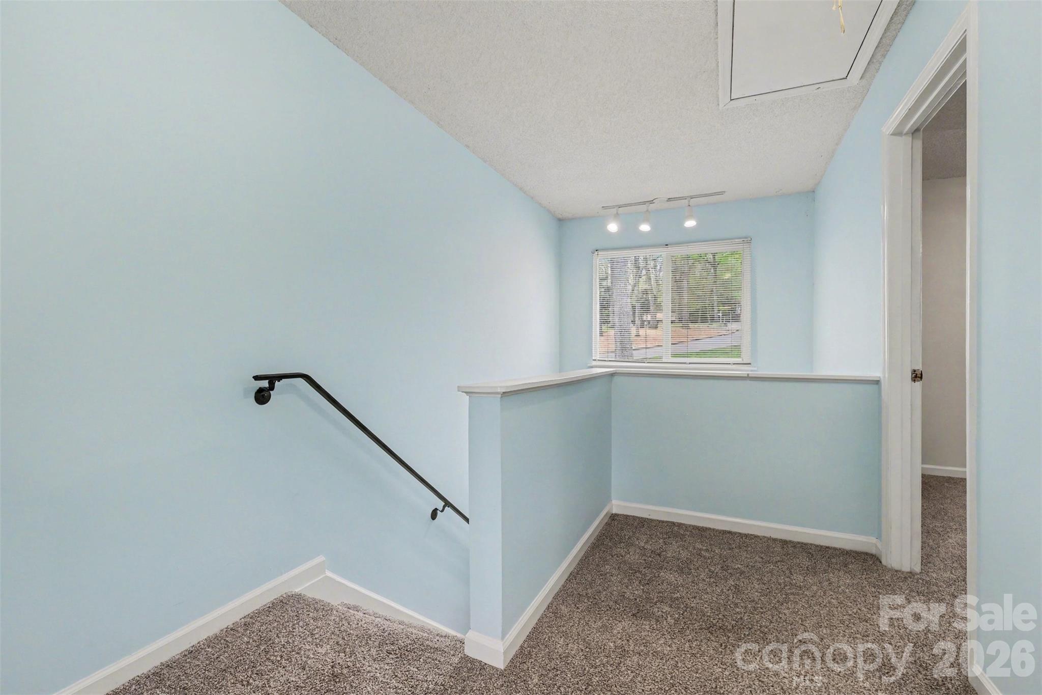 26030 Misty Way Drive Tega Cay, SC 29708 - Photo 14 of 43 a view of an empty room with a window