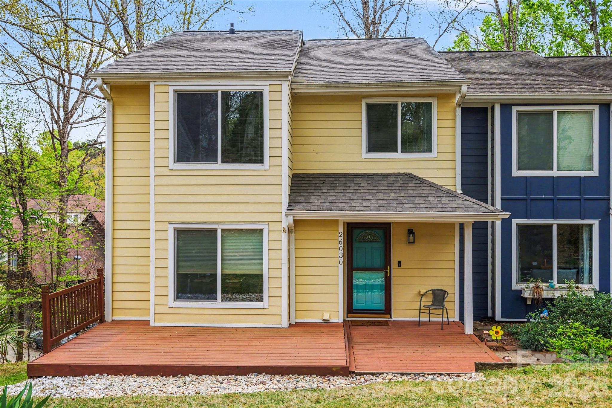 26030 Misty Way Drive Tega Cay, SC 29708 - Photo 2 of 43 a view of a brick house with yard and large tree