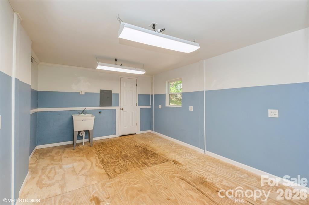 26030 Misty Way Drive Tega Cay, SC 29708 - Photo 24 of 43 a bedroom with a bed and a desk