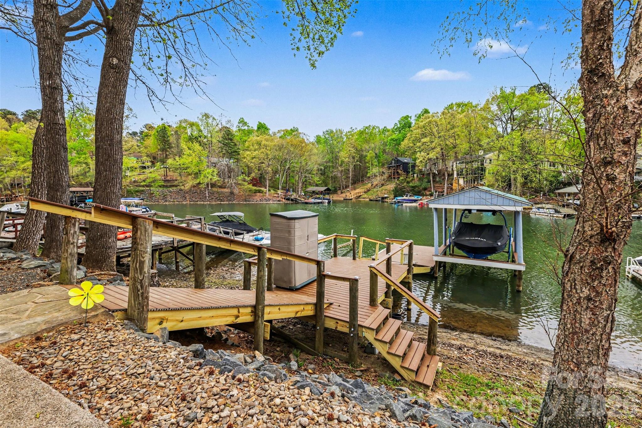 26030 Misty Way Drive Tega Cay, SC 29708 - Photo 27 of 43 a ocean view with sitting space and garden