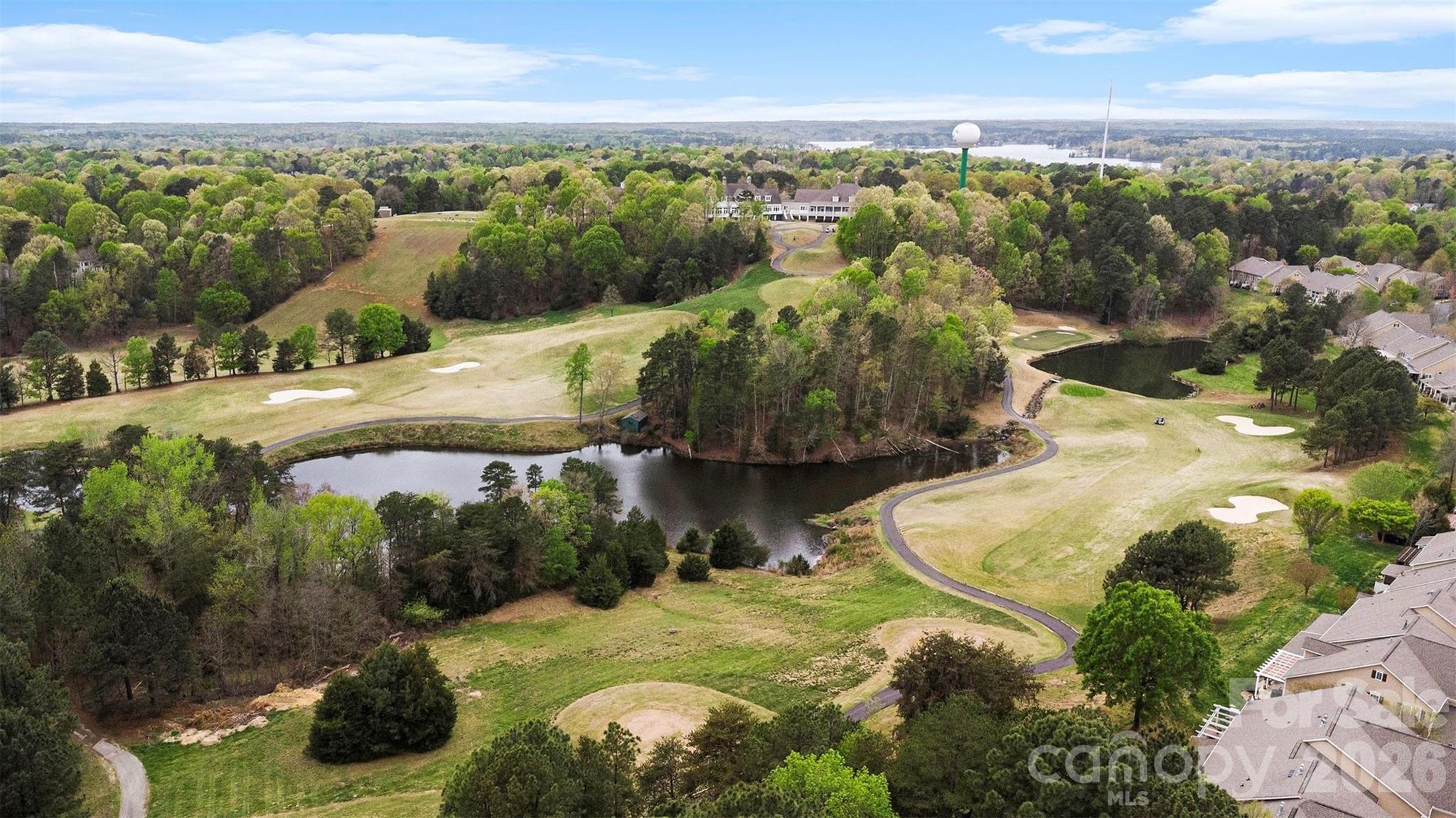 26030 Misty Way Drive Tega Cay, SC 29708 - Photo 31 of 43 a view of a lake in middle of the town