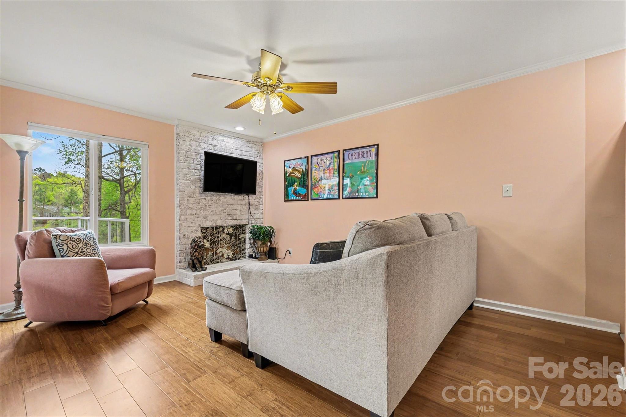 26030 Misty Way Drive Tega Cay, SC 29708 - Photo 7 of 43 a living room with furniture and a flat screen tv