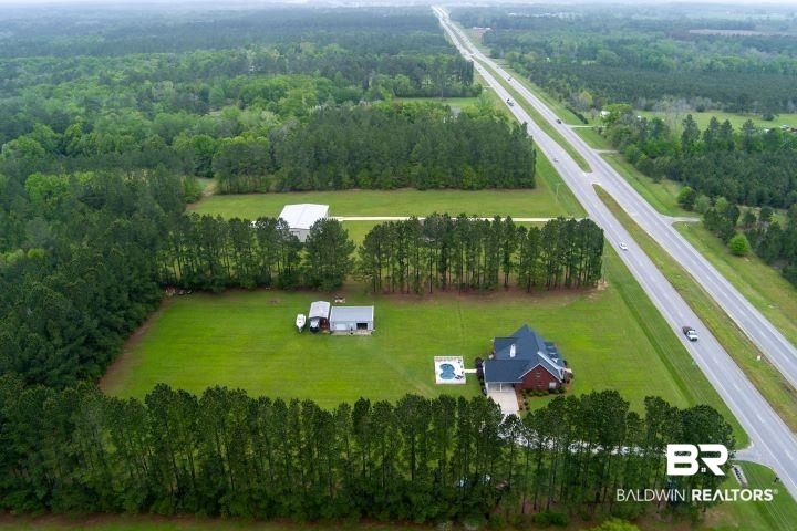 24541 Baldwin Beach Expressway Robertsdale, AL 36567 - Photo 40 of 51 Birds eye view of property featuring a rural view