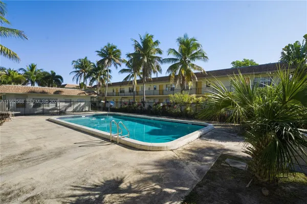 a view of outdoor space and swimming pool