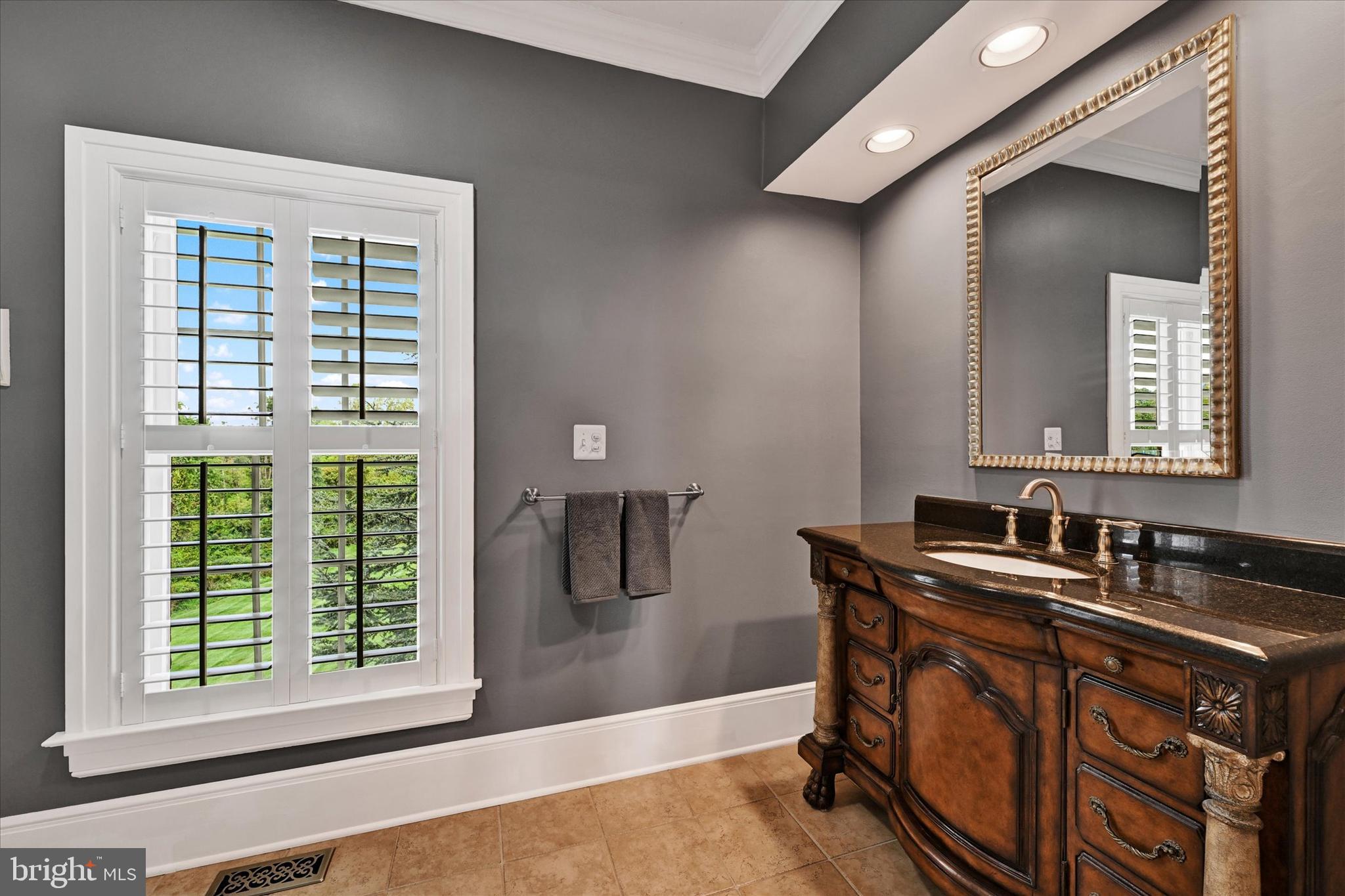 2258 Baldwin Mill Road Fallston, MD 21047 - Photo 45 of 82 a bathroom with a sink and a mirror