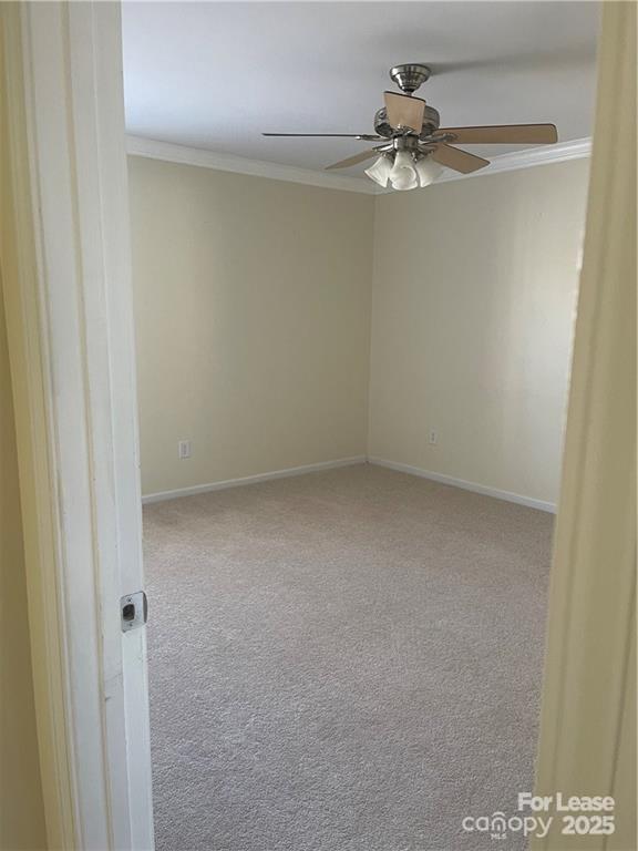 11917 Stratfield Pl Circle, Unit 118 Pineville, NC 28134 - Photo 12 of 28 a view of a small space with a chandelier fan
