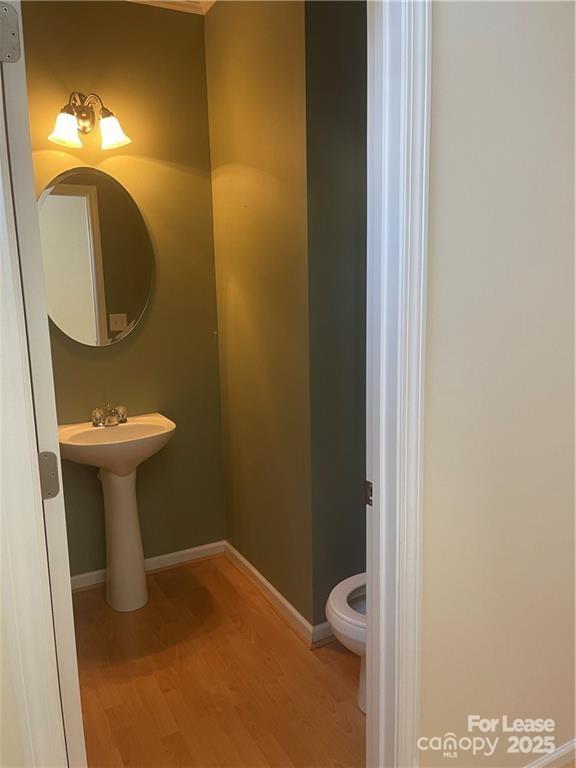 11917 Stratfield Pl Circle, Unit 118 Pineville, NC 28134 - Photo 13 of 28 a bathroom with a sink and a mirror