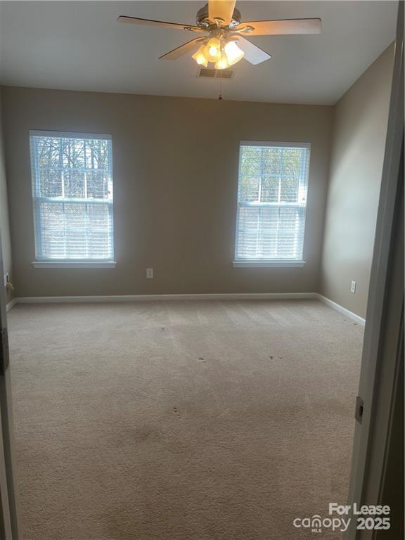 11917 Stratfield Pl Circle, Unit 118 Pineville, NC 28134 - Photo 20 of 28 an empty room with a window