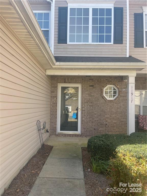 11917 Stratfield Pl Circle, Unit 118 Pineville, NC 28134 - Photo 2 of 28 a front view of a house