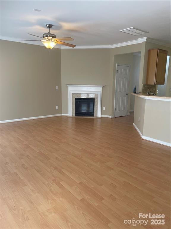 11917 Stratfield Pl Circle, Unit 118 Pineville, NC 28134 - Photo 8 of 28 a view of a livingroom with a fireplace