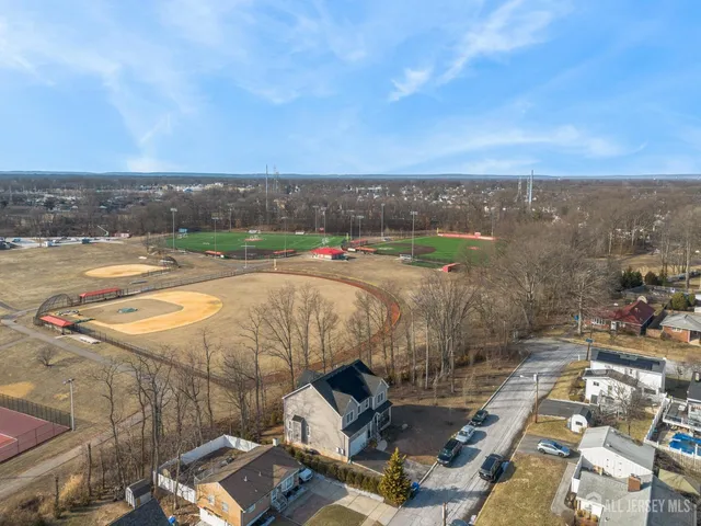 a view of balcony with wooden floor and outdoor seating