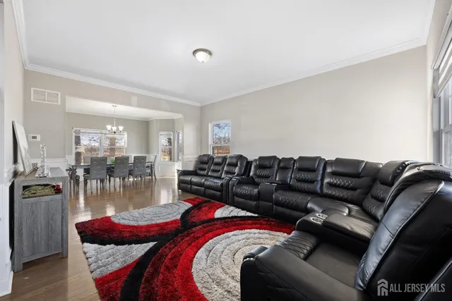 a living room with furniture and a table