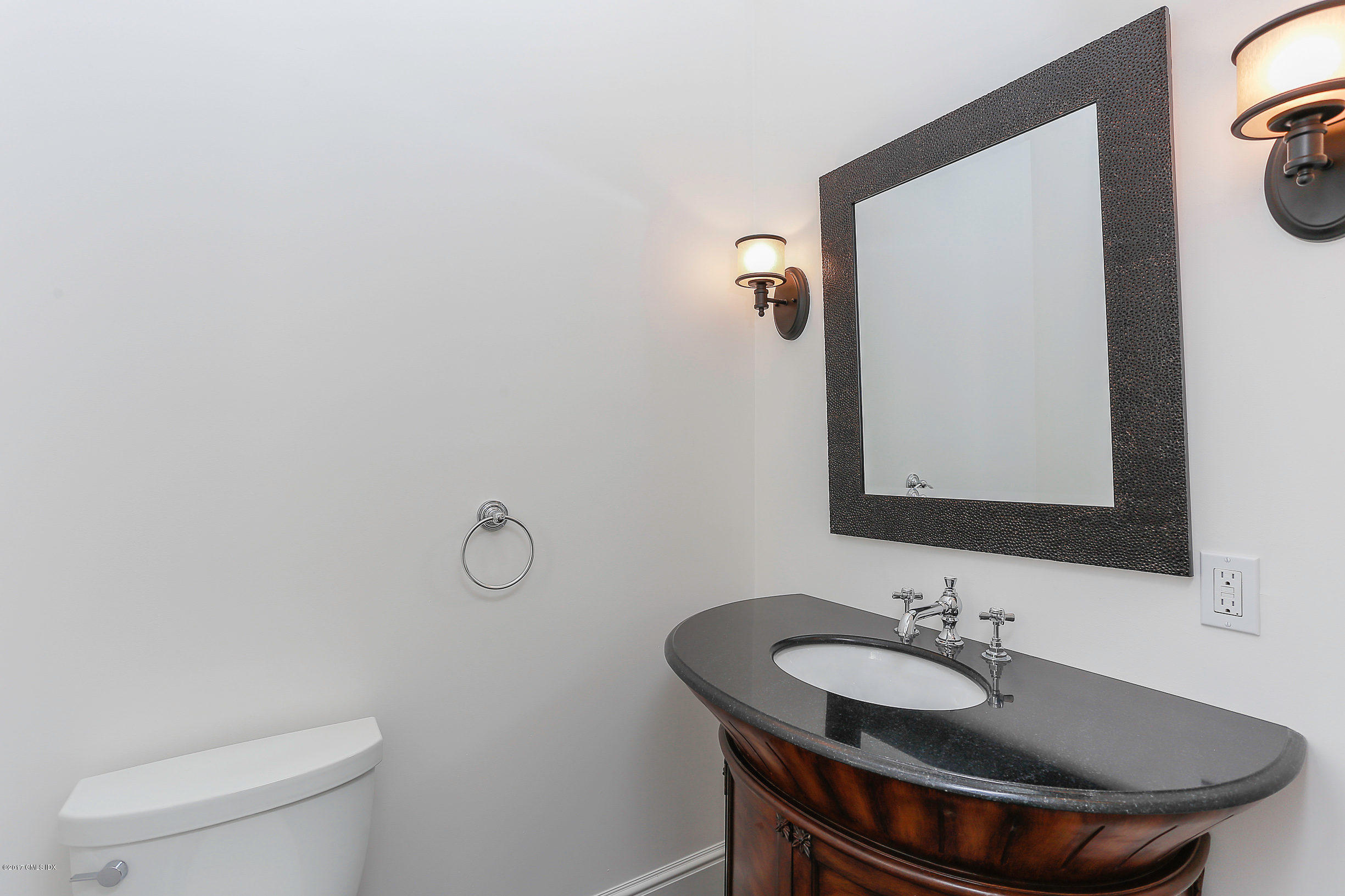 1 Club Road Riverside, CT 06878 - Photo 17 of 37 a bathroom with a toilet sink and mirror