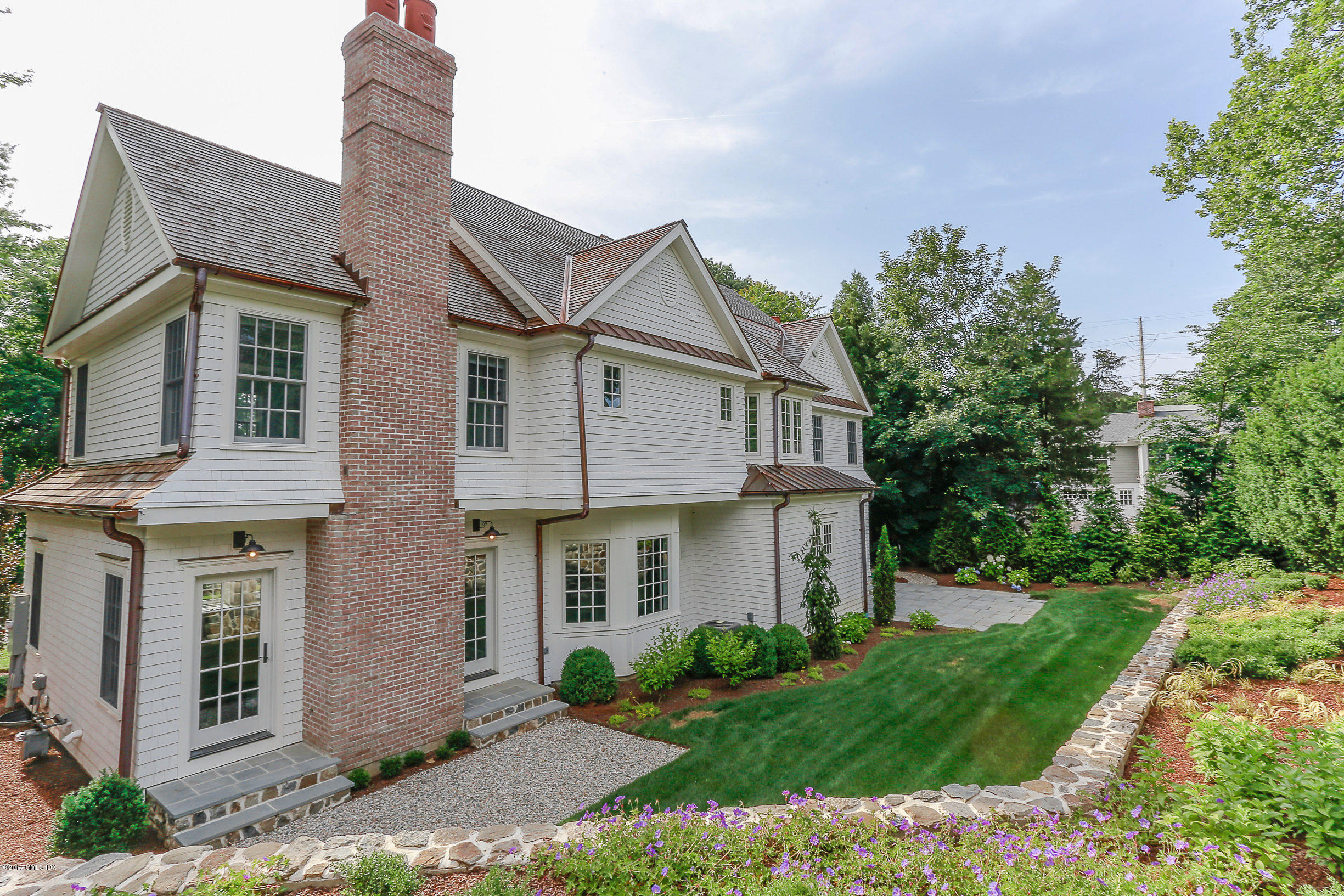 1 Club Road Riverside, CT 06878 - Photo 34 of 37 a front view of a house with garden