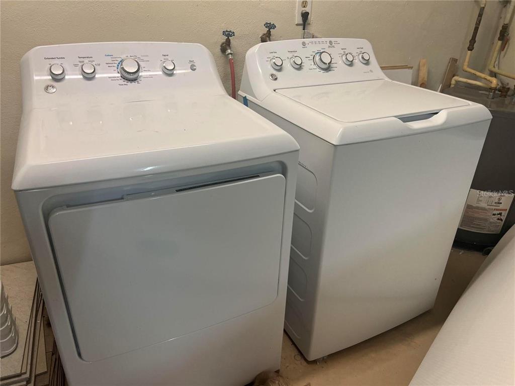 118 Caddy Road Rotonda West, FL 33947 - Photo 10 of 10 a utility room with dryer and washer