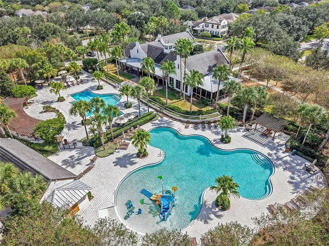 a view of a park that has large trees