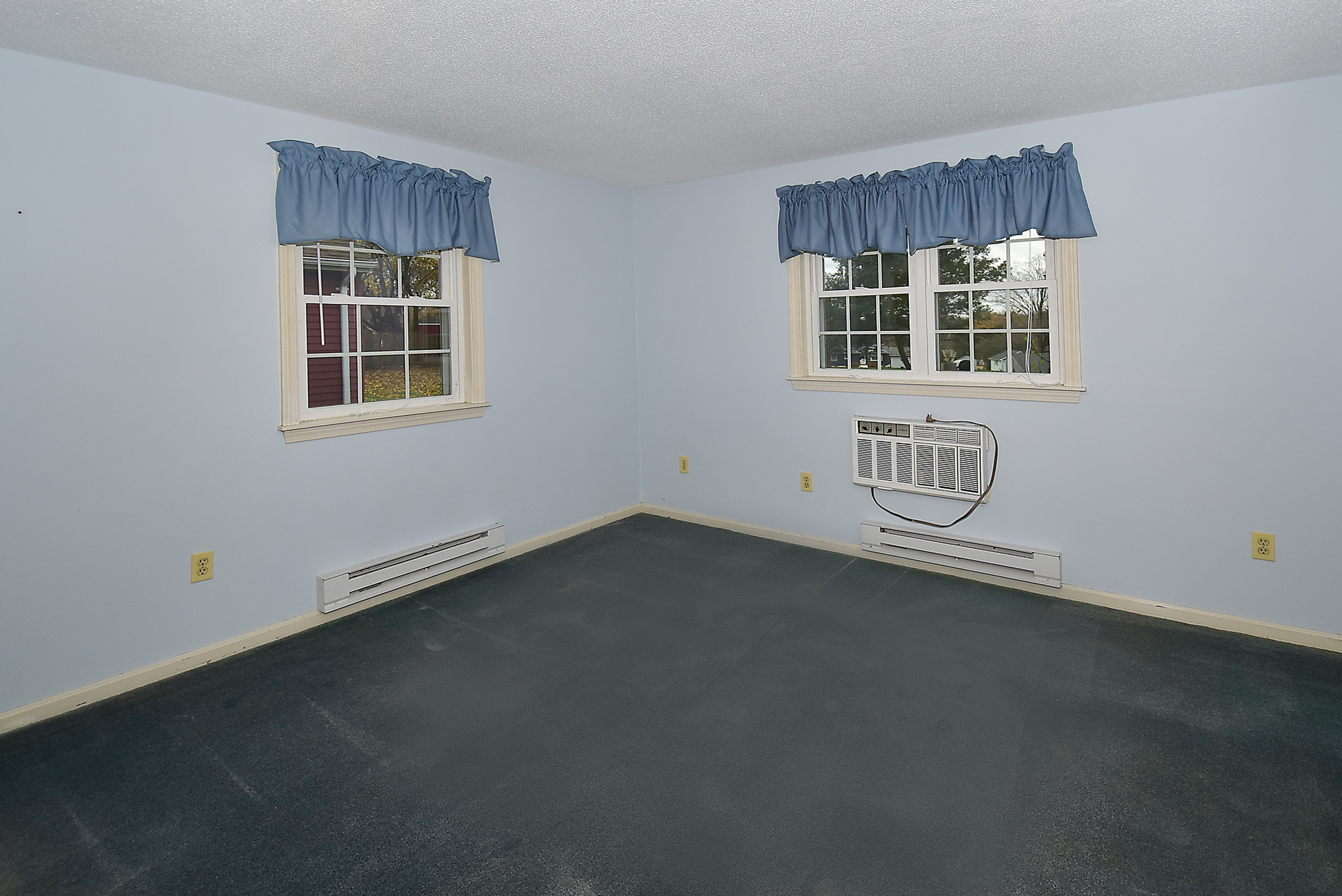 413 Lady Bug Lane, Unit 413 Vernon, CT 06066 - Photo 17 of 28 an empty room with a window
