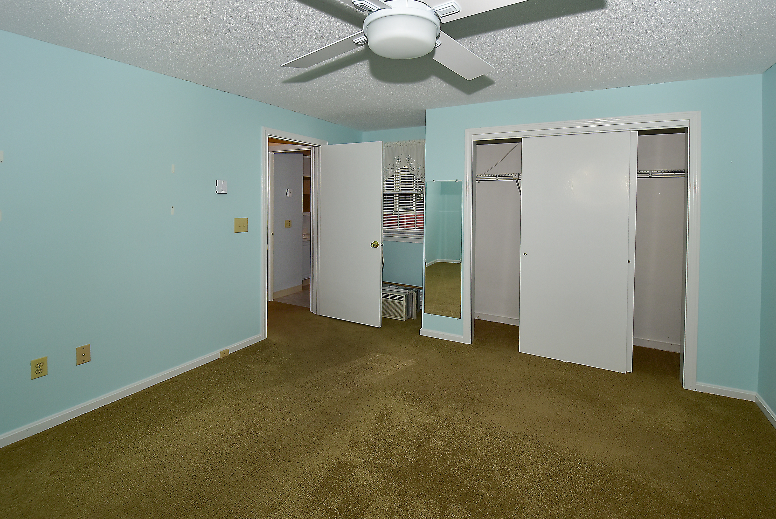 413 Lady Bug Lane, Unit 413 Vernon, CT 06066 - Photo 18 of 28 a view of an empty room with closet area