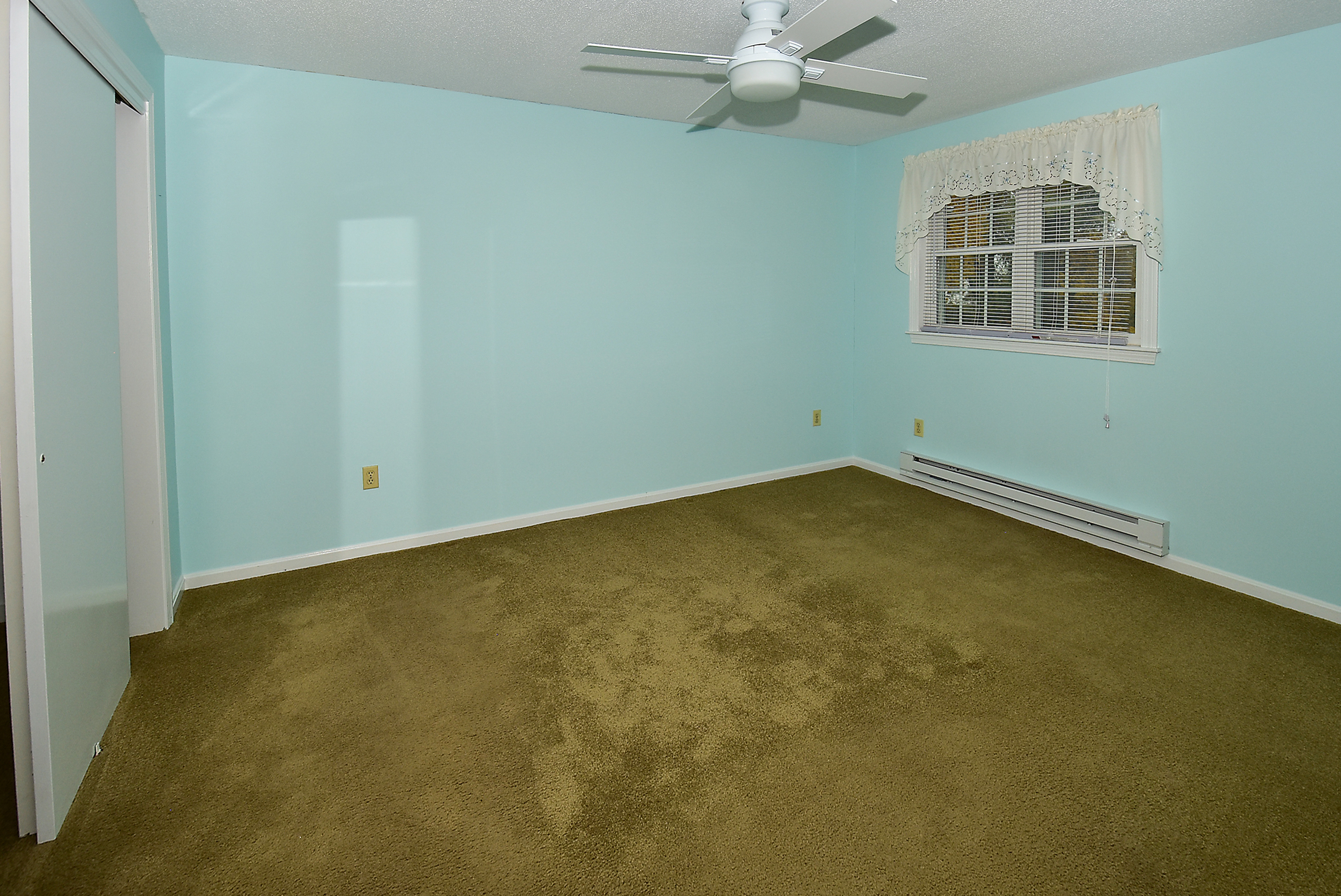 413 Lady Bug Lane, Unit 413 Vernon, CT 06066 - Photo 19 of 28 an empty room with a window
