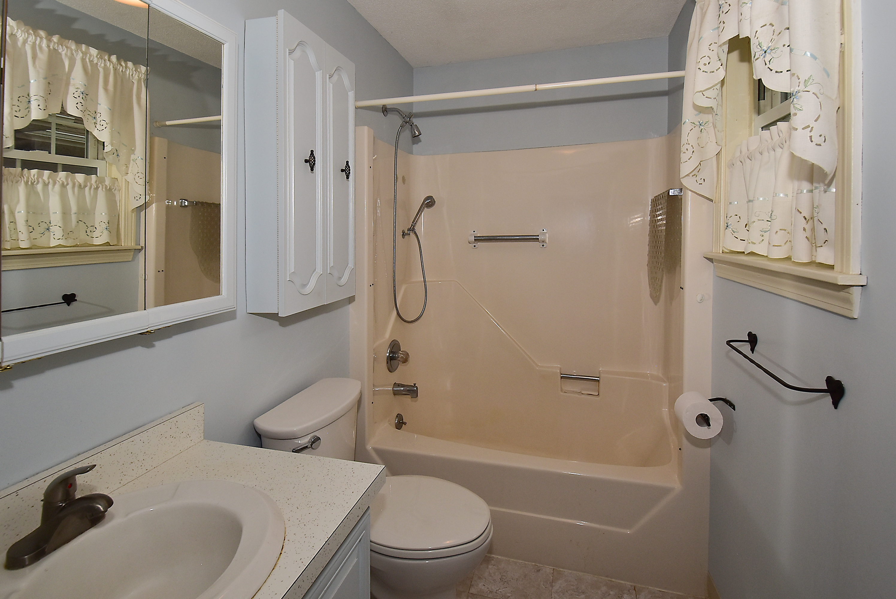 413 Lady Bug Lane, Unit 413 Vernon, CT 06066 - Photo 20 of 28 a bathroom with a sink toilet and shower