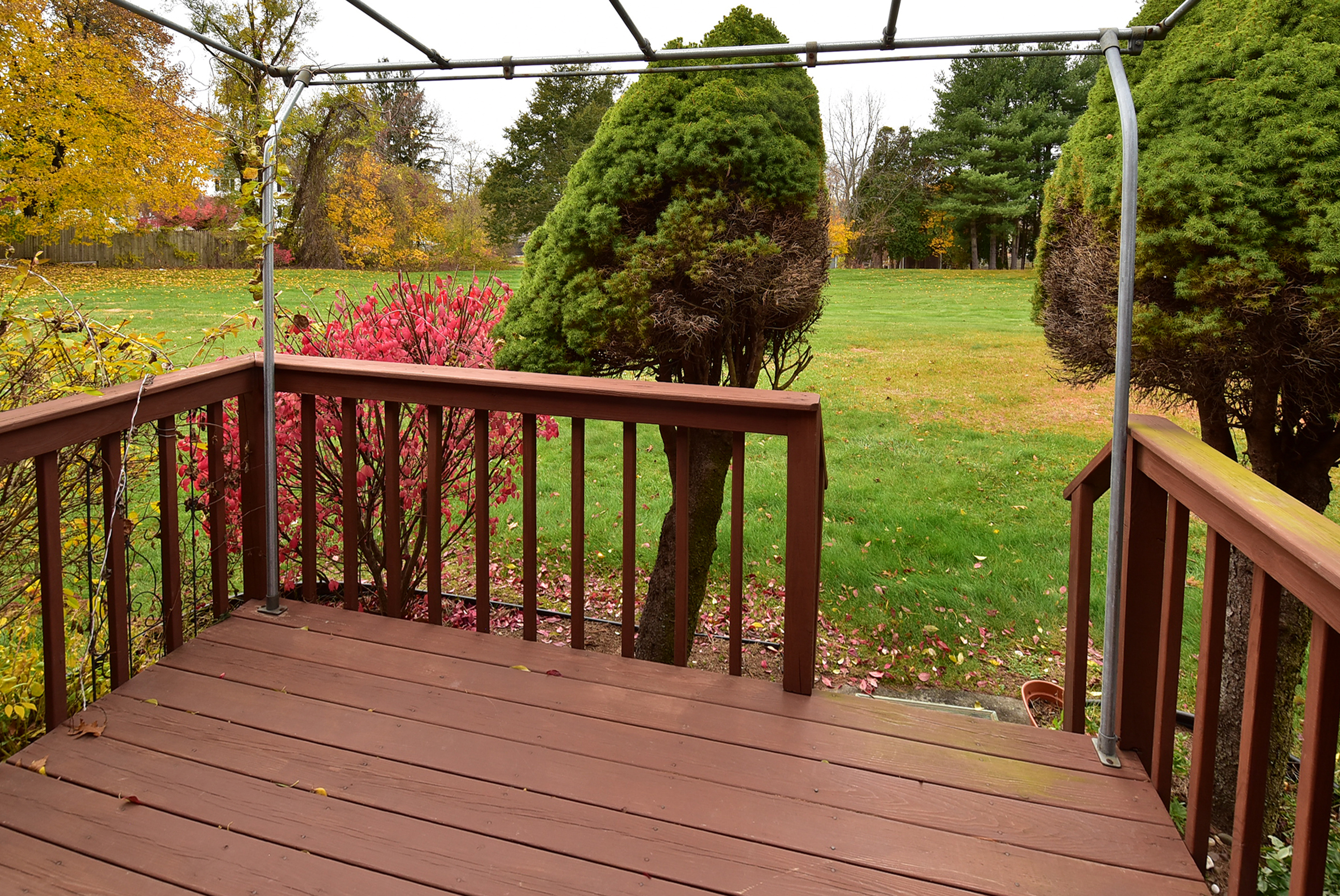 413 Lady Bug Lane, Unit 413 Vernon, CT 06066 - Photo 24 of 28 a view of a balcony with yard