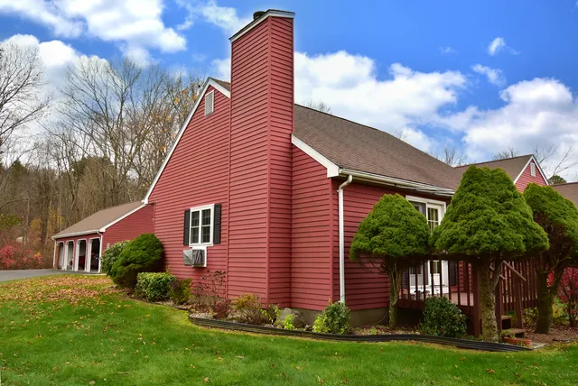 a sign that is on a brick wall