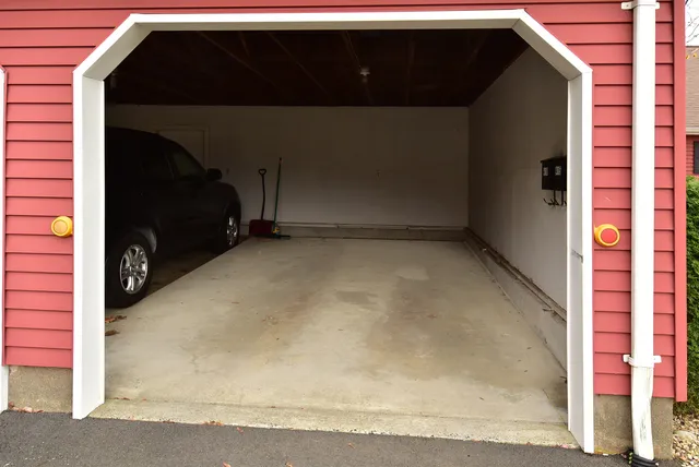 a car parked in front of a house