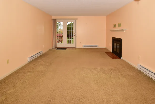 an empty room with windows