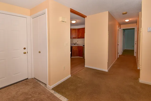 a utility room with sink dryer and washer