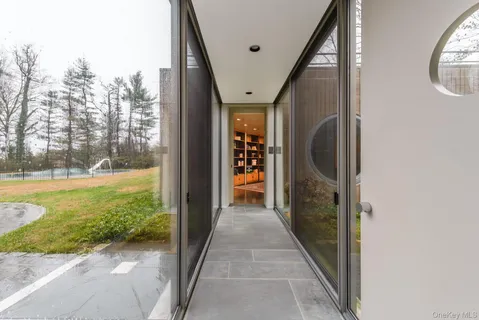 a view of room with furniture and wooden floor