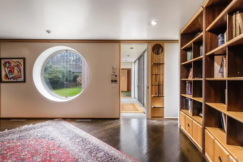 a bathroom with a toilet a sink and shower